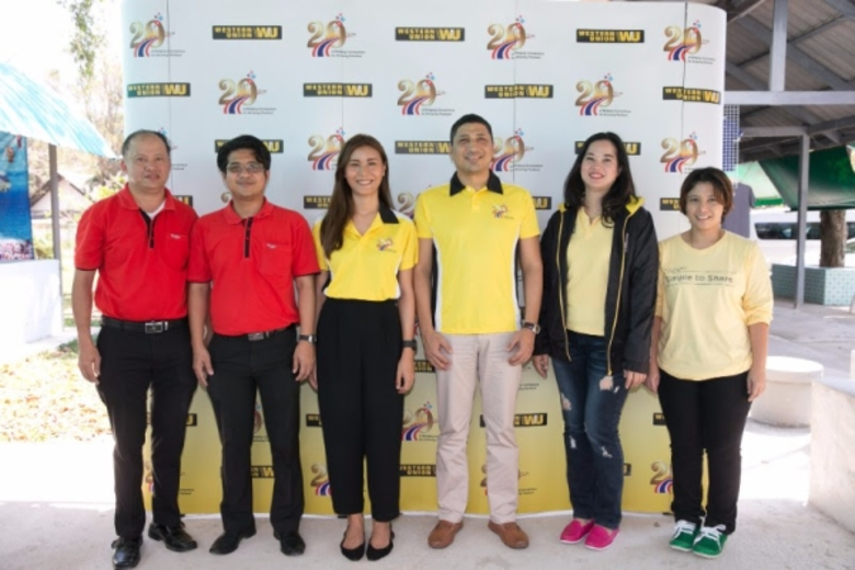 พนักงานจิตอาสาเวสเทิร์น ยูเนี่ยน ผู้นำในก...