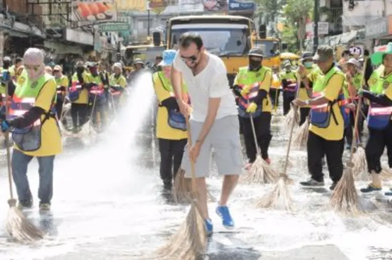 Employees of Western Union and its Bank Agents Clean Khao San Road