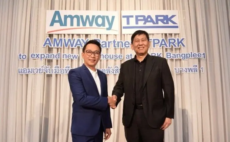 Mr. Kittawat Ritteerawee (left), Managing...