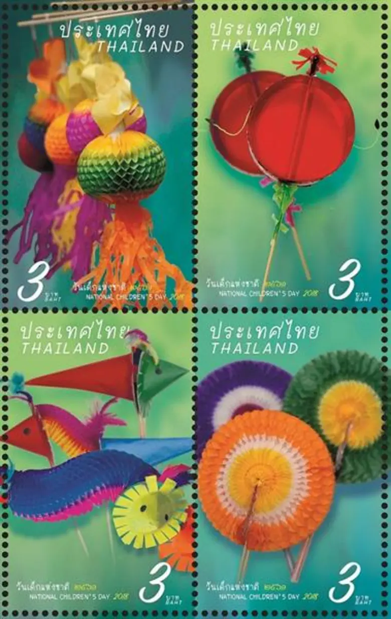 ฟื้นตำนานของเล่นโบราณ! ไปรษณีย์ไทย เปิดตัวแสตมป์วันเด็ก “ของเล่นงานวัด”