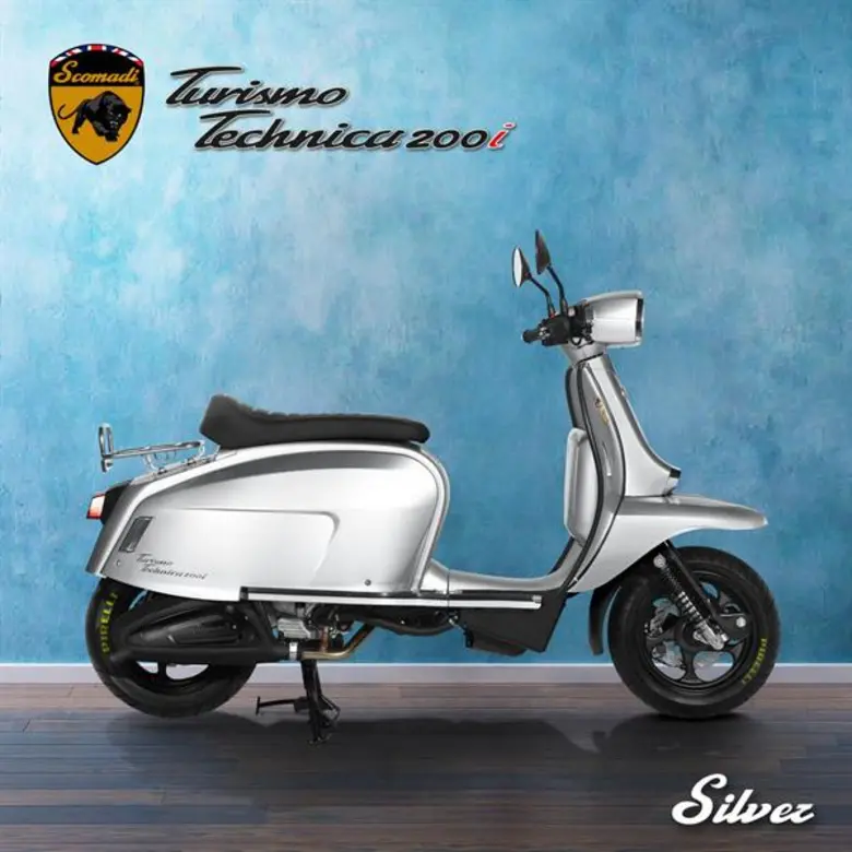 แฟรงค์ แซนเดอร์สัน และ พอล เมลิซี 2 ผู้ร่วมก่อตั้งรถจักรยานยนต์สโกมาดิ ร่วมตรวจสภาพรถ TT 200i คุณภาพพร้อมขาย