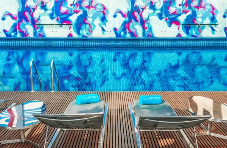 Indulge in vibrant pool time with a "Loun...