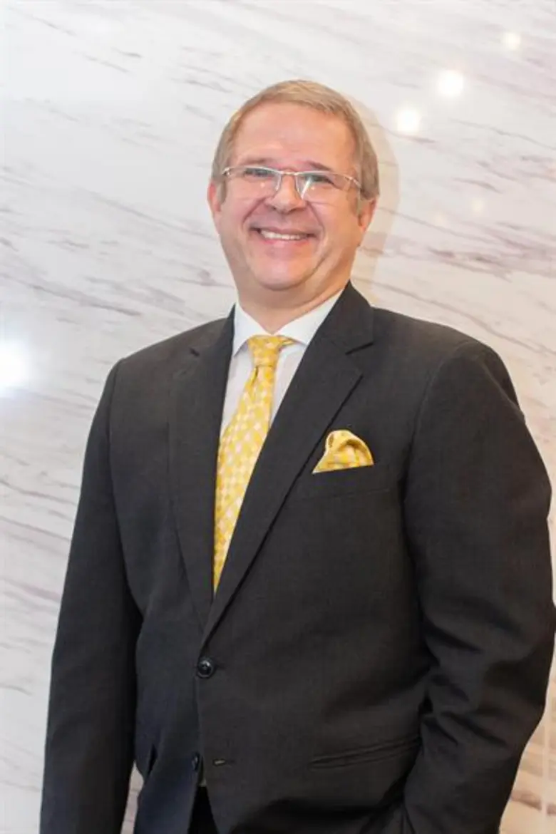 อังเดร เคยดำรงตำแหน่งเป็นผู้จัดการทั่วไป ...