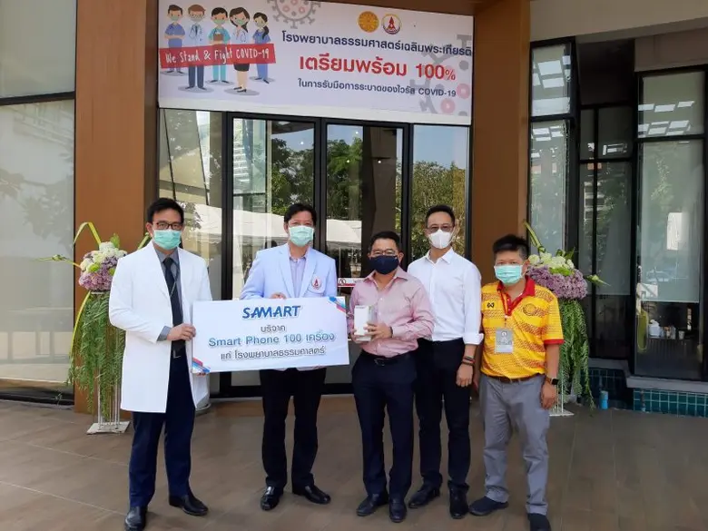 นายวัฒน์ชัย วิไลลักษณ์ (กลาง) กรรมการผู้จ...