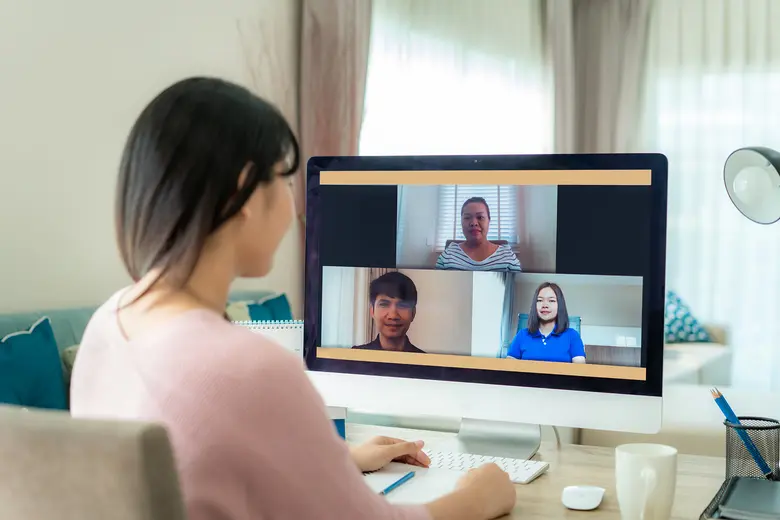 People working at home meeting video conf...