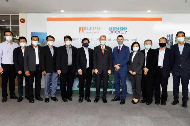 ดร. ฮาราลด์ ลิงค์ ประธาน บี.กริม และประธา...