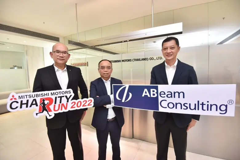 Teeraphan Laongsri (right), Director, Man...