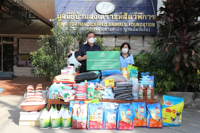 สุทธิชัย พูนลาภทวี (ซ้าย) กรรมการผู้จัดกา...