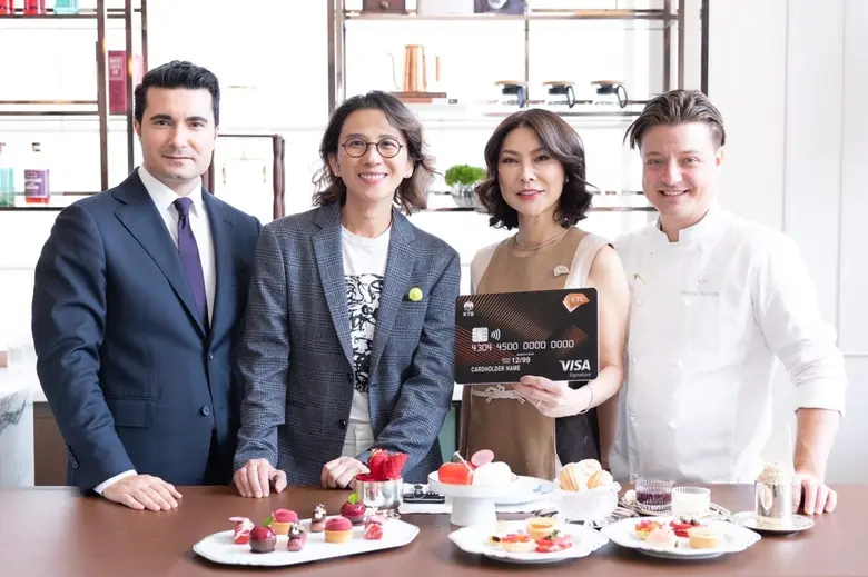 Ms. Prym Panyasereeporn (center to the ri...